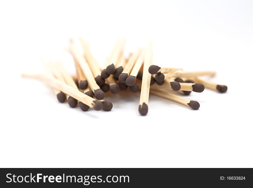 Pile of matches isolated on white background. Pile of matches isolated on white background