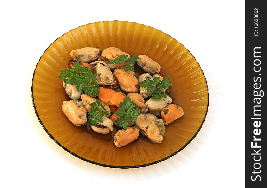 Mussels on a brown plate with parsley