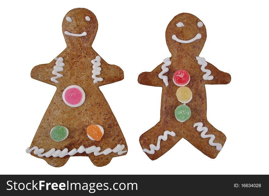 A Gingerbread Couple, isolated on white. Photographed in a studio.