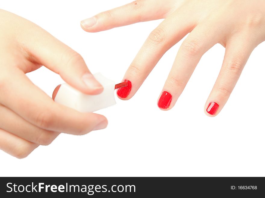 Woman hands applying nail polish. Woman hands applying nail polish