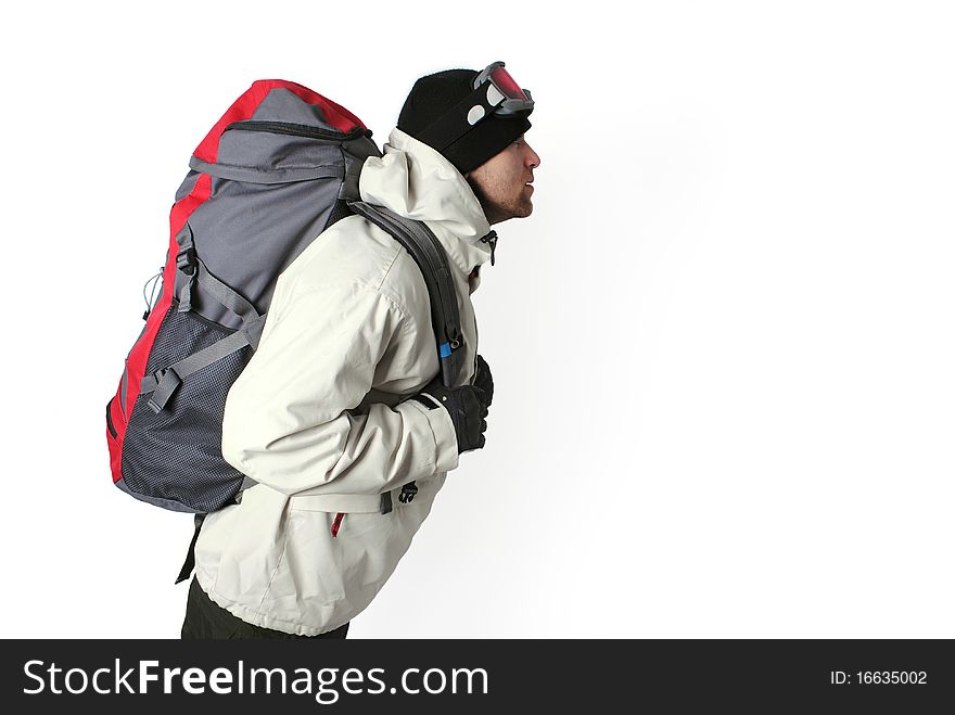 Posing man with winter clothes and rucksack isolated on a white background. Posing man with winter clothes and rucksack isolated on a white background