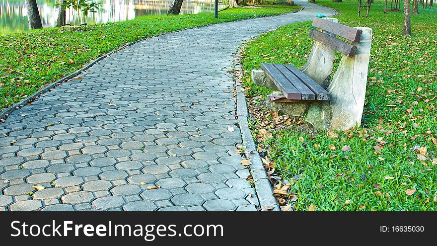 Bench And Walkway In A Public Park