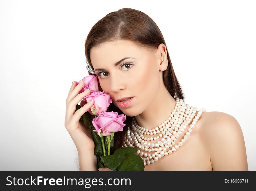 Young beautiful sexy woman with flowers roses