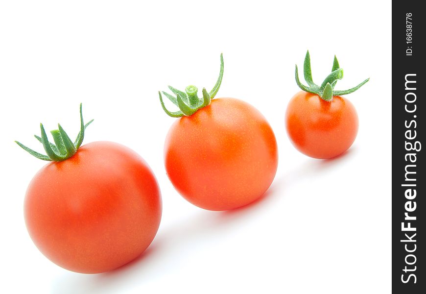 Red cherry tomato, on white background