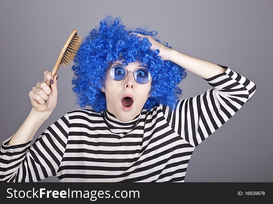 Surprised Blue Hair Girl With Comb.