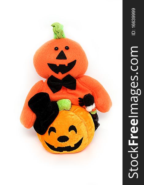 Trick halloween ghost caddy and smiling pumpkin shaped doll. Trick halloween ghost caddy and smiling pumpkin shaped doll