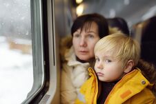 Family Looking Out Of The Window Of Train During Travel On Cogwheel Railway/rack Railway In Alps Mountains Stock Photos