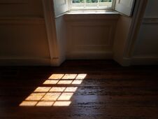 Light From Glass Window On Wood Floor Stock Image