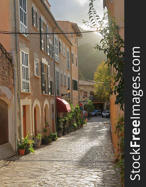 A Street Of The Old Village Of Valldemossa In The Mountains Of The Island Of Palma De Mallorca