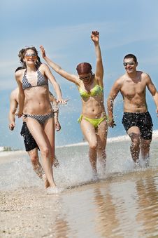 Friends Having Fun At The Beach Stock Photography Friends Having Fun At The Beach Stock Photography