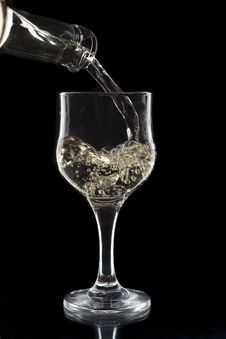 White Wine Being Poured Royalty Free Stock Photography White Wine Being Poured Royalty Free Stock Photography