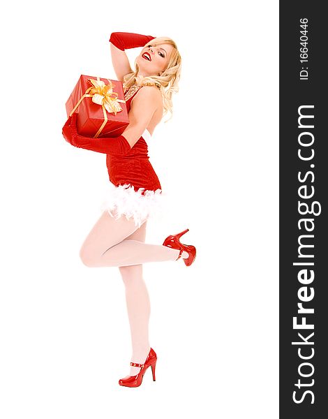 Santa helper girl on white background with long blond hair and red gift box. Santa helper girl on white background with long blond hair and red gift box
