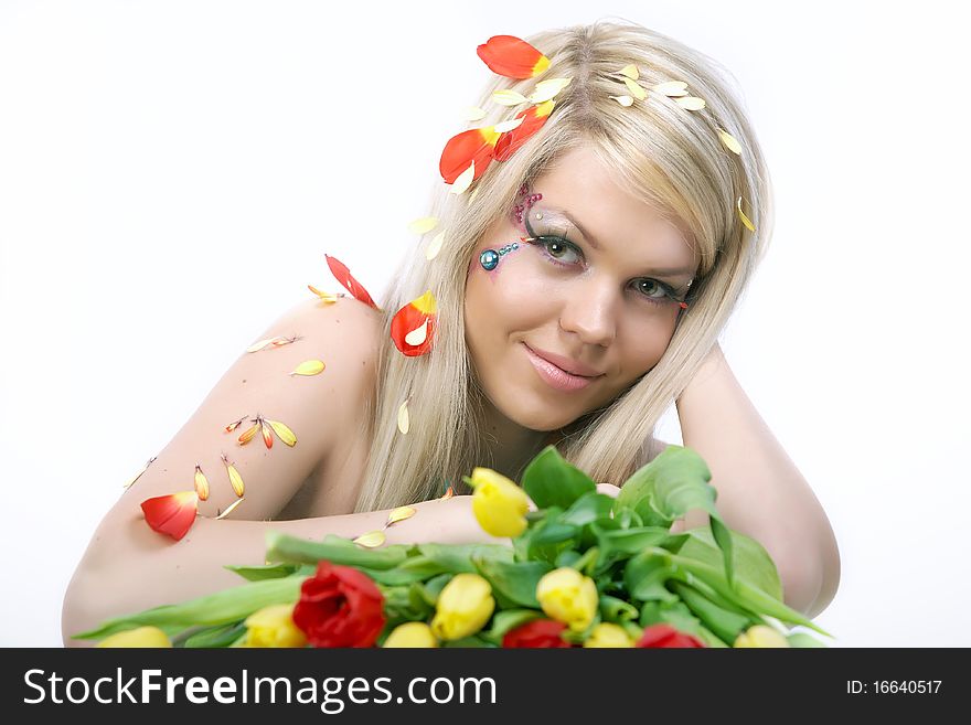 Happy young woman holding a bunch with tulips. Happy young woman holding a bunch with tulips