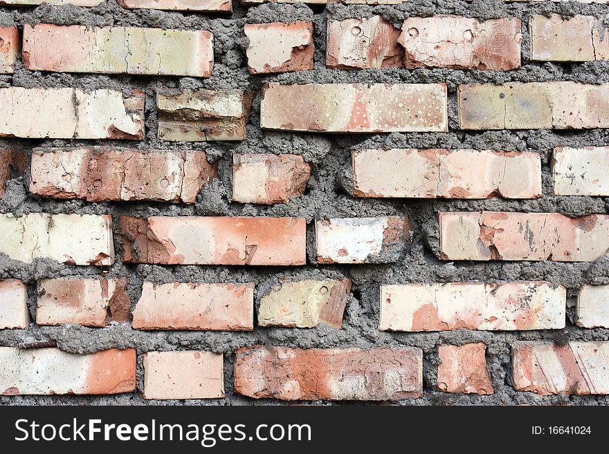 Soviet old red brick wall with the fixing cement. Soviet old red brick wall with the fixing cement