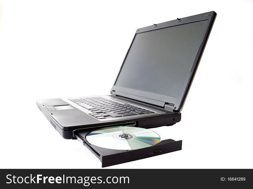 Laptop With Open Drawer And Disc.