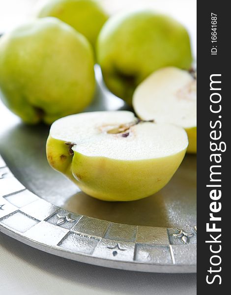 Cut Quince on pewter tray