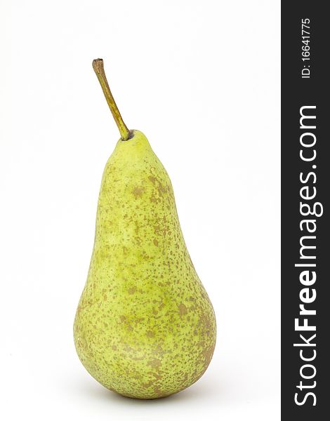 One ripe pear on white background