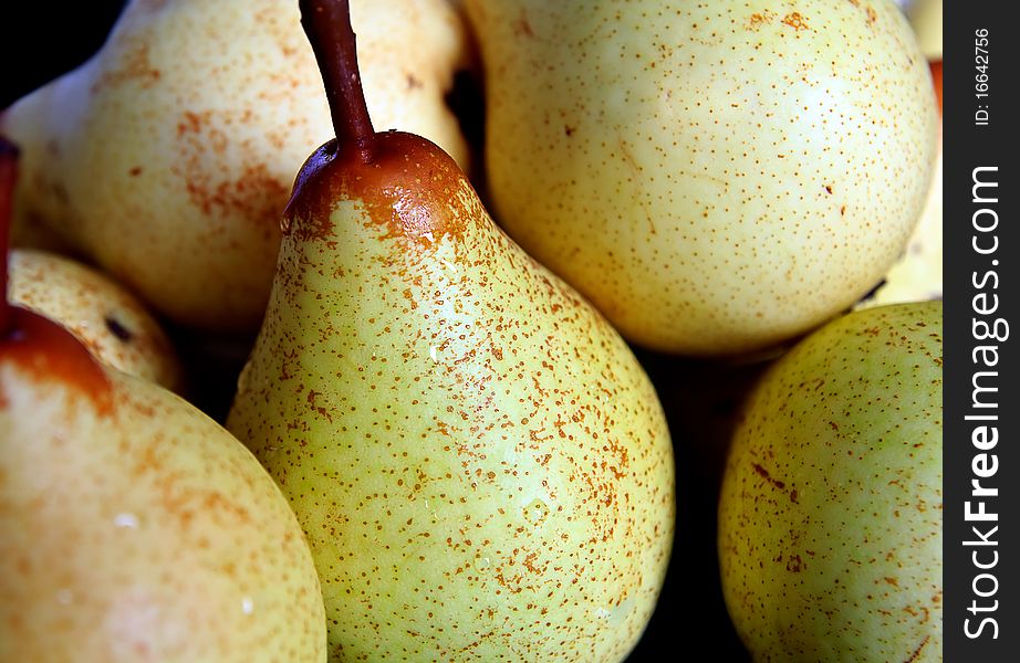A pile of fresh pears. A pile of fresh pears