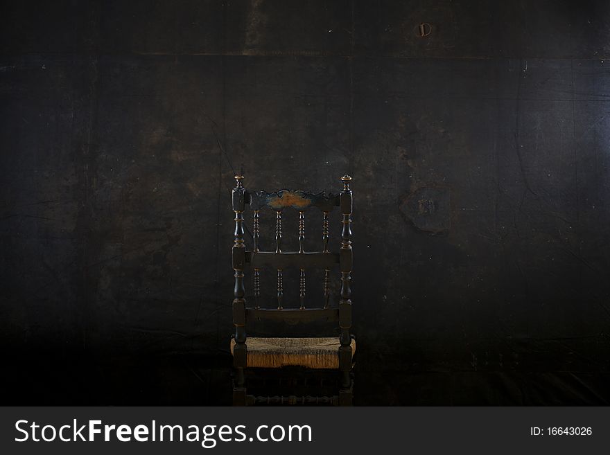 Old Chair on a black background