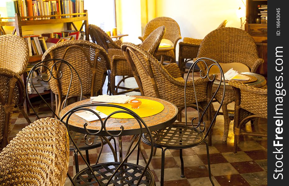 Wicker chairs in a pub