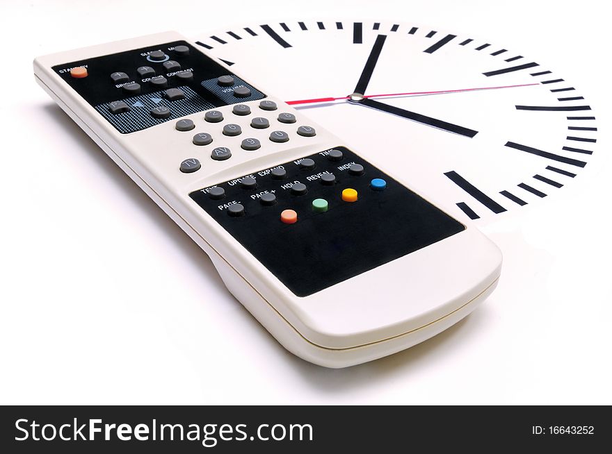 TV Remote Control and clock on white background. TV Remote Control and clock on white background