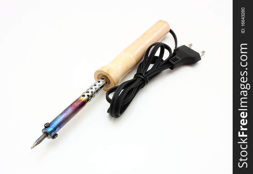 A soldering iron isolated on a white background