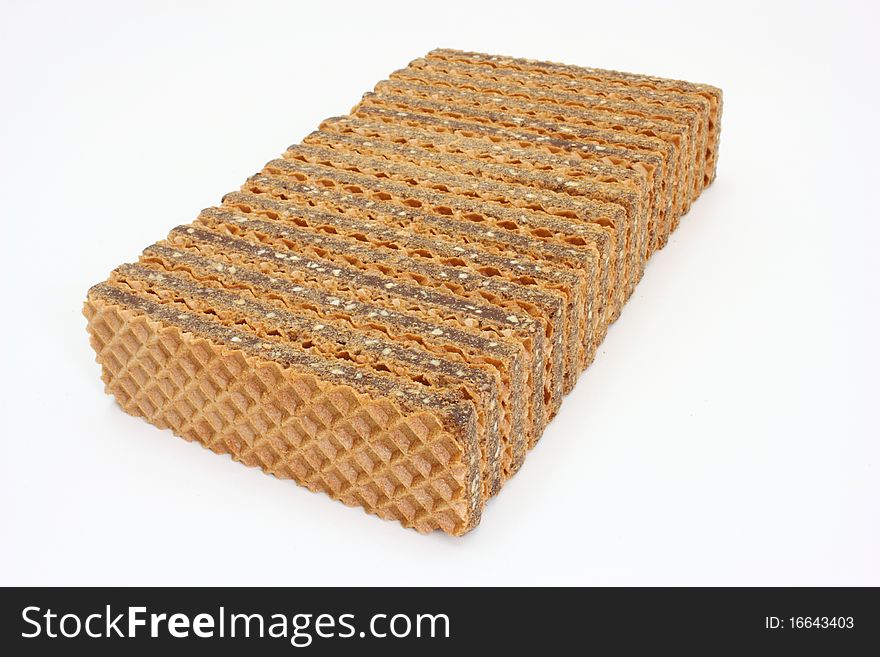 Wafer cookies with chocolate are isolated on a white background