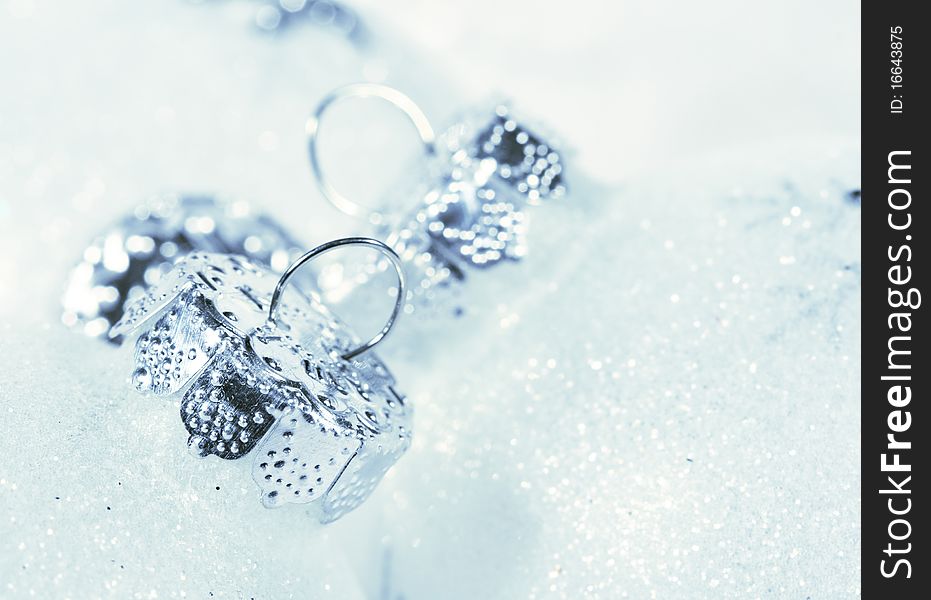 Frosted Christmas baubles in luxurious snow-white feathers. Frosted Christmas baubles in luxurious snow-white feathers