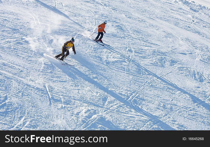 Skiers is skiing at a ski resort