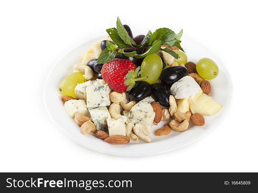 Cheese plate with grapes, nuts and strawberry. Cheese plate with grapes, nuts and strawberry