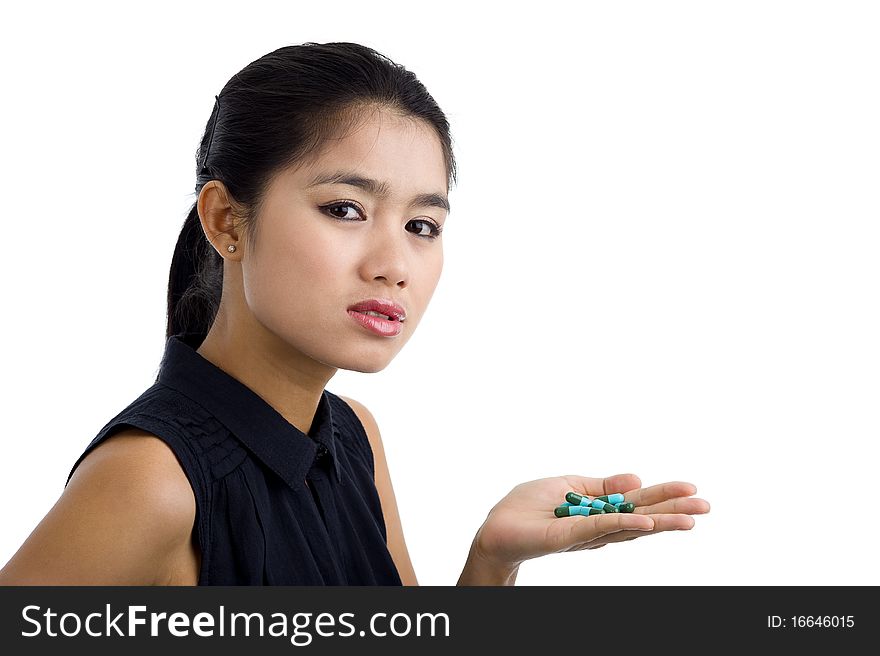 Woman with pills in hand, isolated on white background