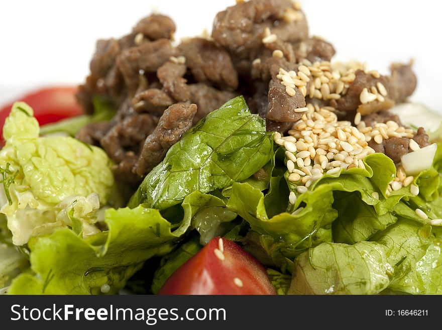 Macro shot of sesame Beef  with Vegetables
