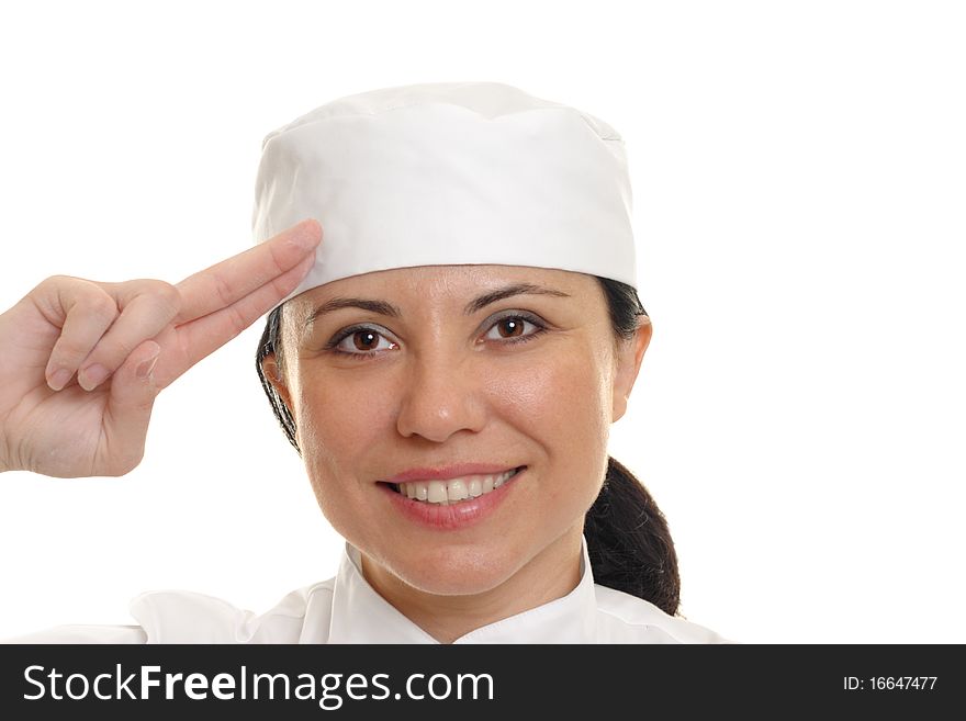 Beautiful smiling female chef salutes.  White background. Beautiful smiling female chef salutes.  White background.