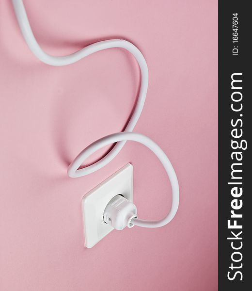 Electric Power Cable on Pink Background