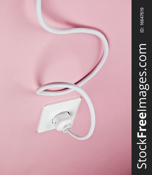 Electric Power Cable on Pink Background