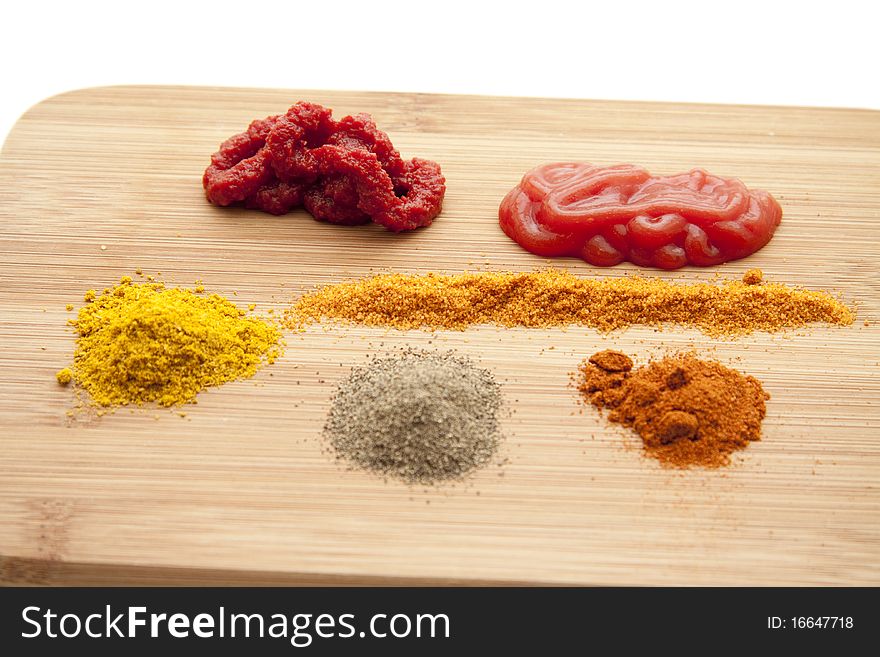 Spices with ketchup and tomato marks