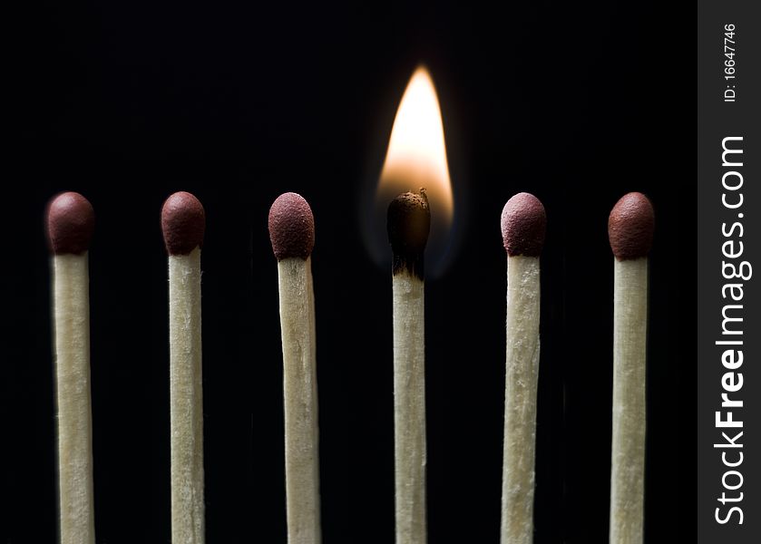 Group of Matches on black background