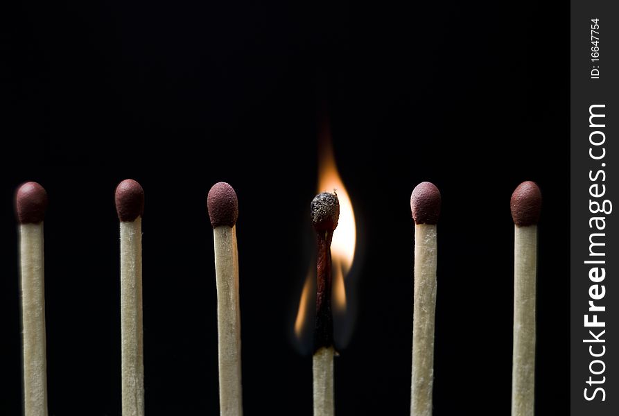 Group of Matches on black background