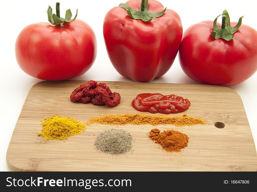 Spices with ketchup and tomato marks