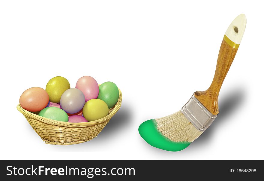 This image shows a colored eggs in a wicker basket and a brush with paint. This image shows a colored eggs in a wicker basket and a brush with paint