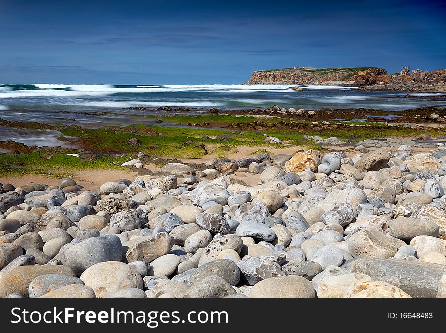 Sandy beach with rocks in portugal
