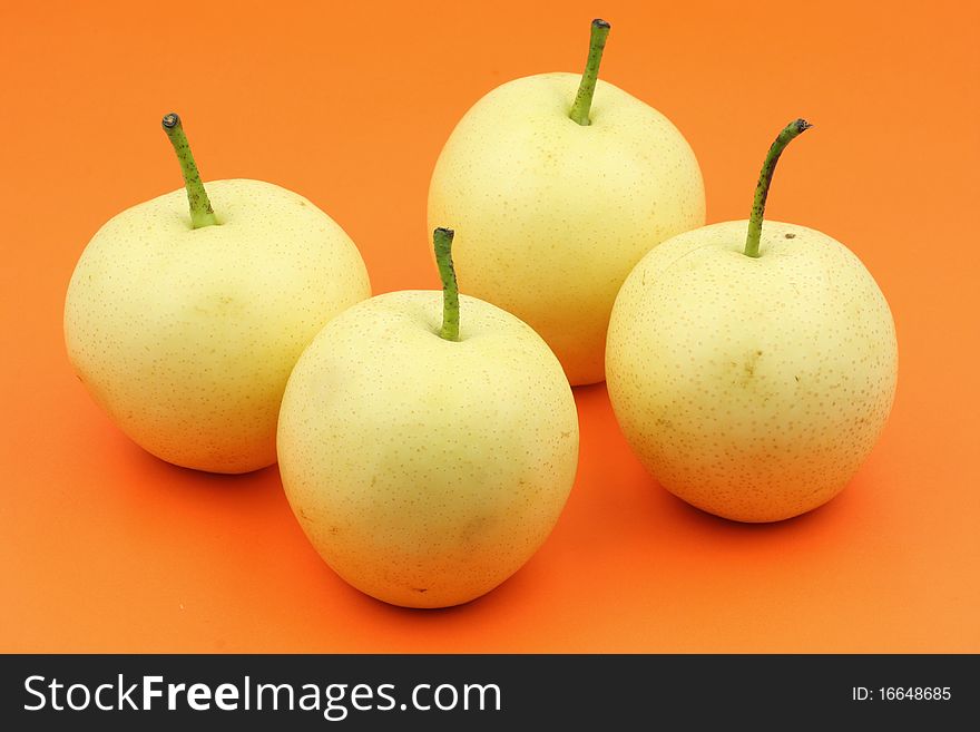 Four PEAR in the orange background