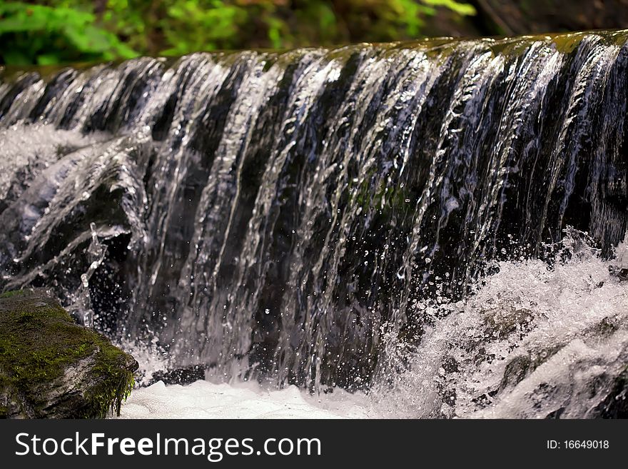 Waterfall Water cascade moss stones. Waterfall Water cascade moss stones