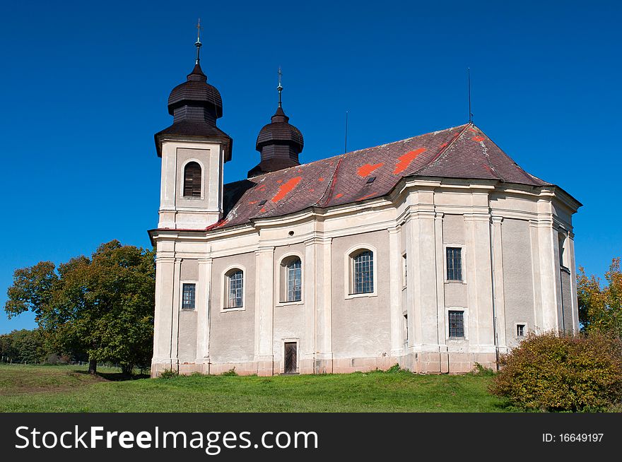 Baroque chapel during the autumn time, sunny day.