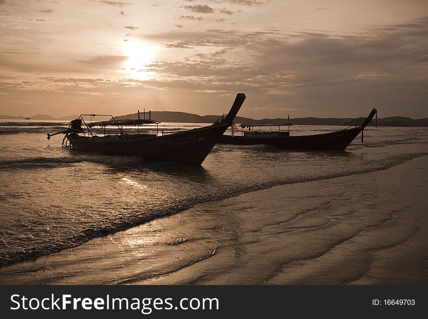 Long tail boats on beach