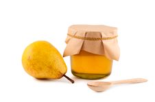 Honey Pear Wooden Spoon Isolated. Royalty Free Stock Photography Honey Pear Wooden Spoon Isolated. Royalty Free Stock Photography