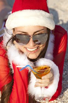 Woman In Christmas Suit With Martini On The Beach Royalty Free Stock Photos Woman In Christmas Suit With Martini On The Beach Royalty Free Stock Photos