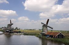 Dutch Windmill On A Canals Edge Stock Image Dutch Windmill On A Canals Edge Stock Image