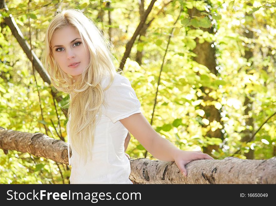 Young beautiful girl on natural background