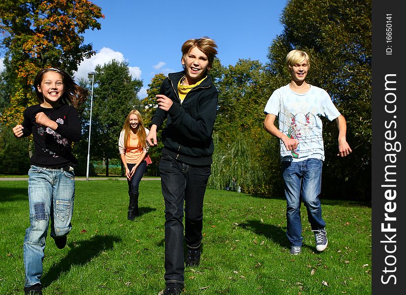 Happy family have fun and stroll in park. Happy family have fun and stroll in park